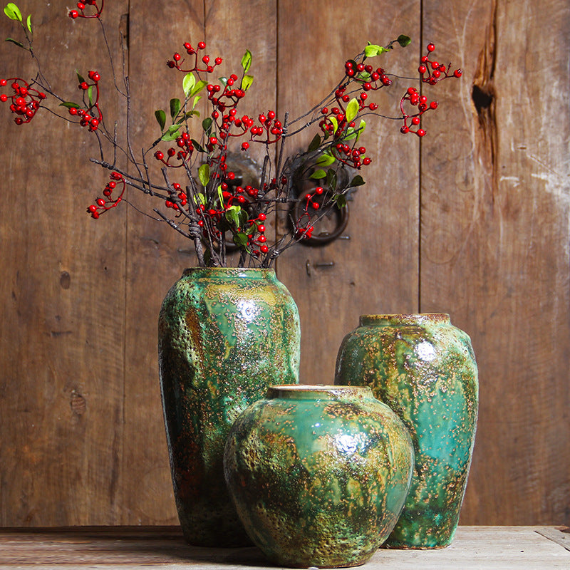 Three green patina ceramic vases in small medium and large sizes