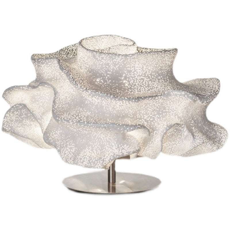 Organic sculptural table lamp on round metal base