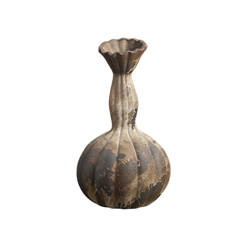 Aged rust brown fluted long-neck ceramic vase isolated product view
