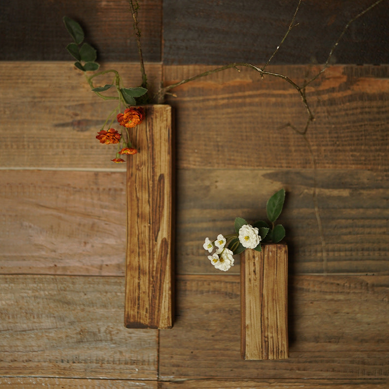 Faux wood grain rectangular ceramic vases mounted and styled on wood wall