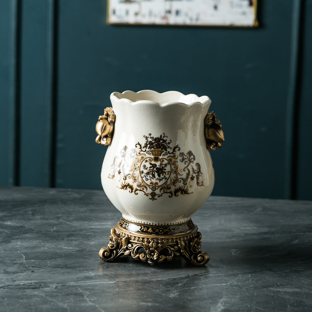 Vintage European ceramic vase with black ornamental medallion pattern and ornate handles