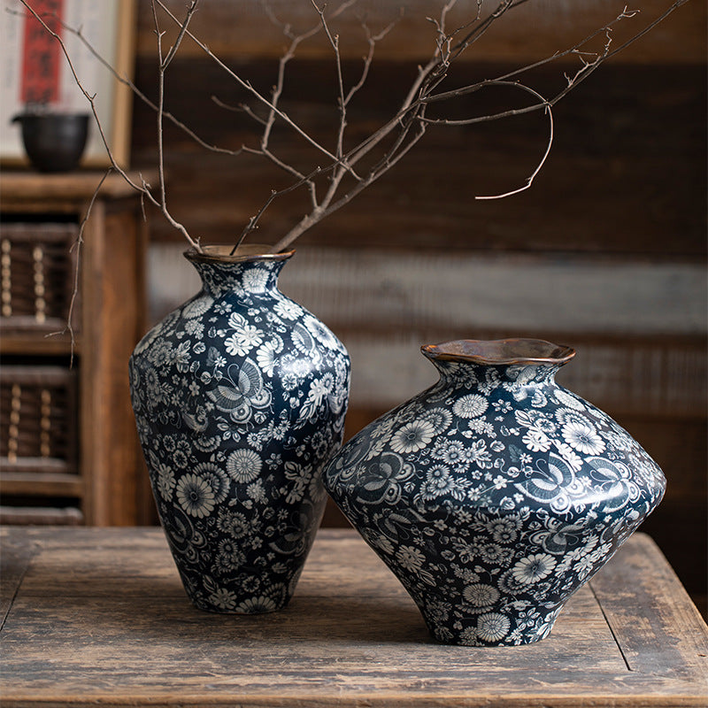 Tall and wide indigo floral ceramic vases styled together