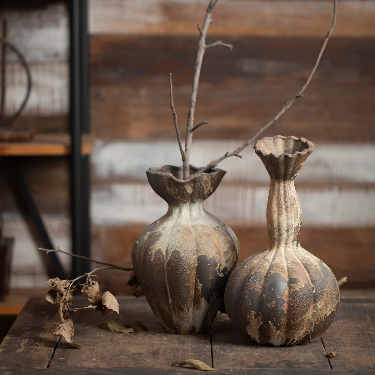 Aged rust brown fluted gourd ceramic vase pair in two silhouettes