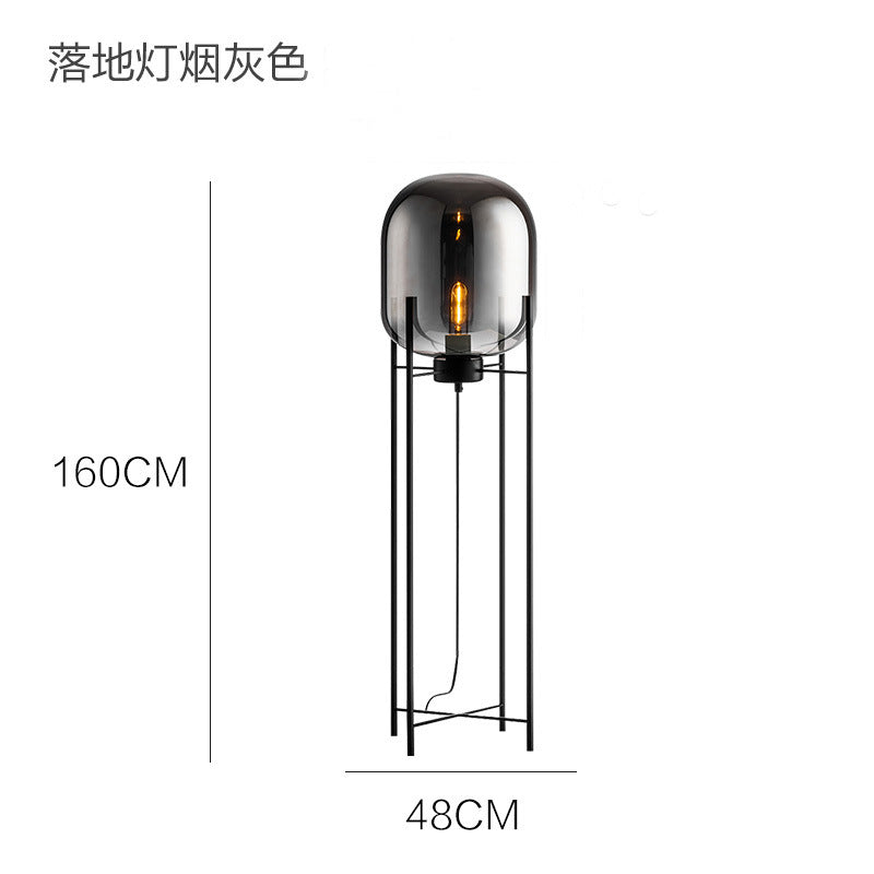 Tall smoke grey glass cage floor lamp in modern interior