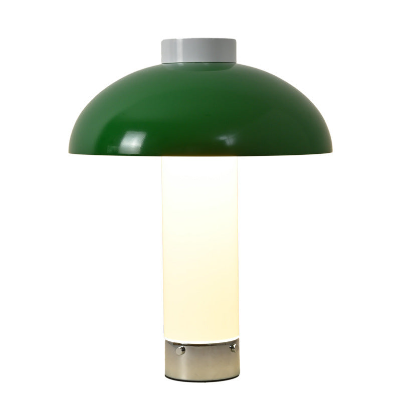 Green postmodern bedside lamp on side table