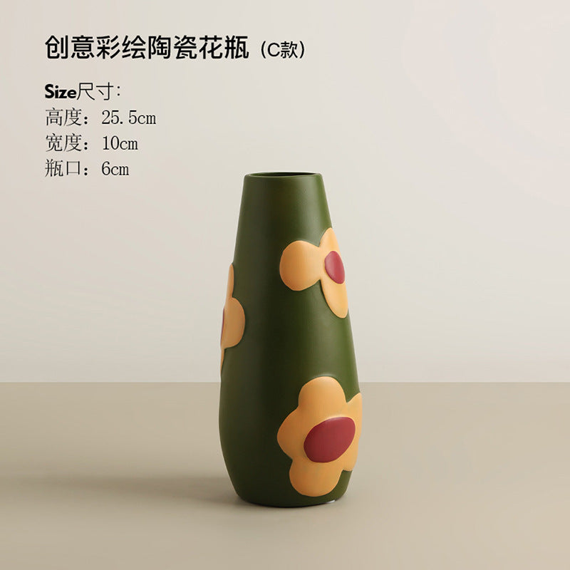 Olive green tall hand-painted ceramic vase with raised flower motifs, 25.5 cm high and 10 cm wide
