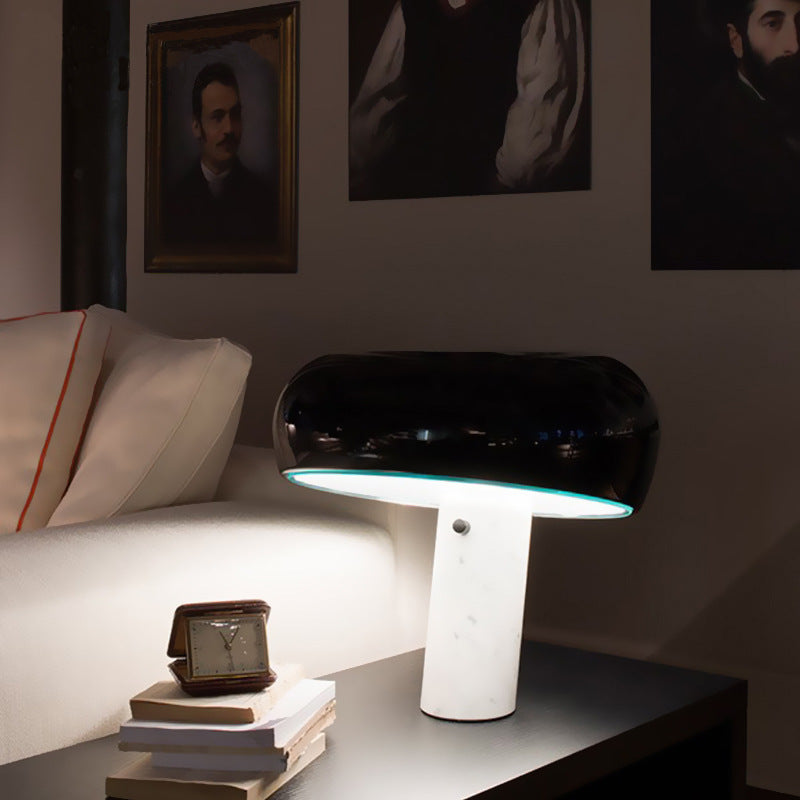 Black marble mushroom lamp styled in contemporary bedroom