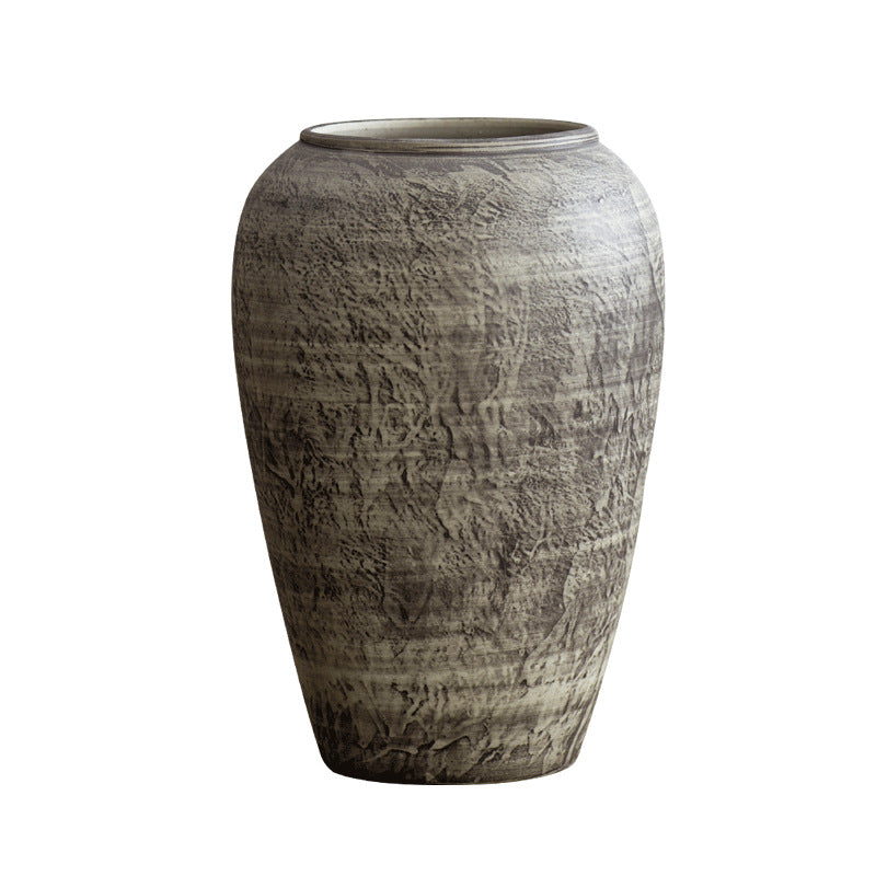 Weathered grey brown ceramic vase isolated product view