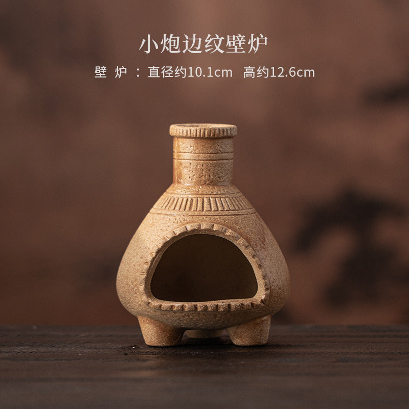 Natural sand ribbed ceramic ritual fireplace approximately 10.1 cm wide and 12.6 cm high