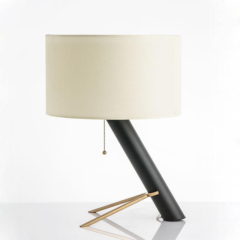 Black postmodern table lamp with gold architectural foot detail