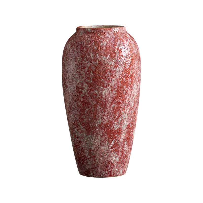 Tall berry red ceramic vase isolated on white background