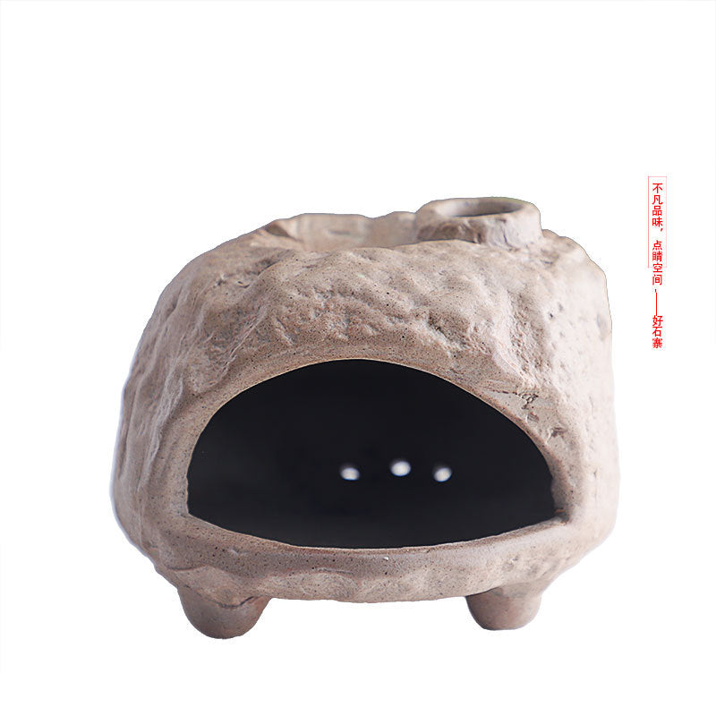 Stone cave ceramic ritual fireplace approximately 10.7 cm wide by 8.7 cm high