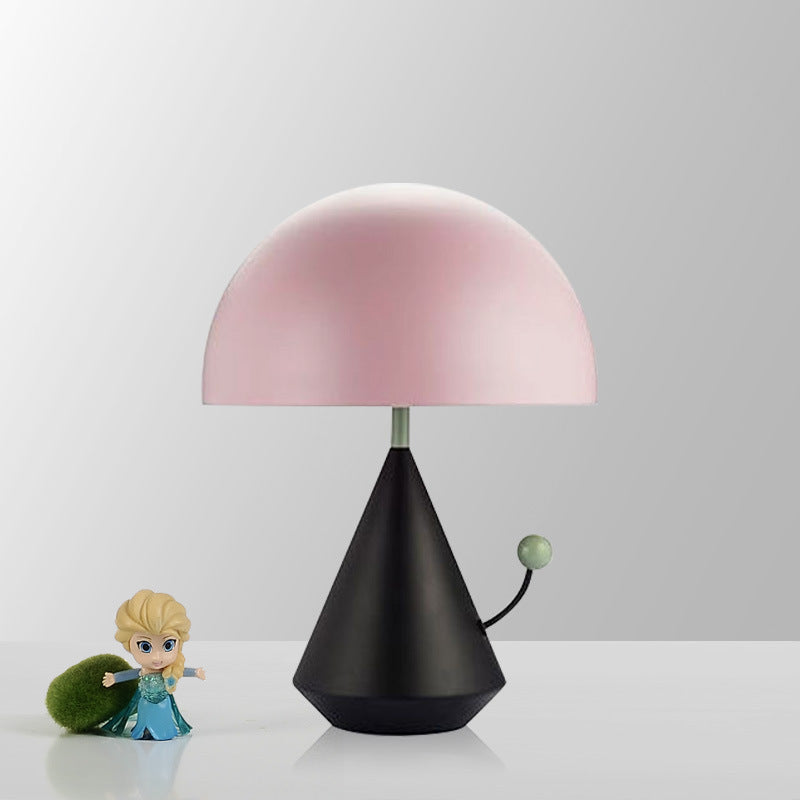 Blush pink dome table lamp with matte black cone base