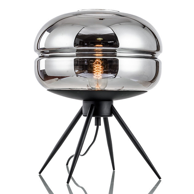 Glass tripod bedside lamp close styling view