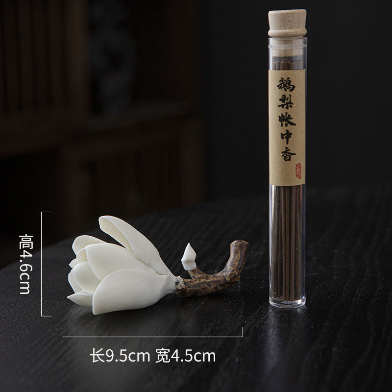 White magnolia incense holder paired with traditional Goose Pear incense