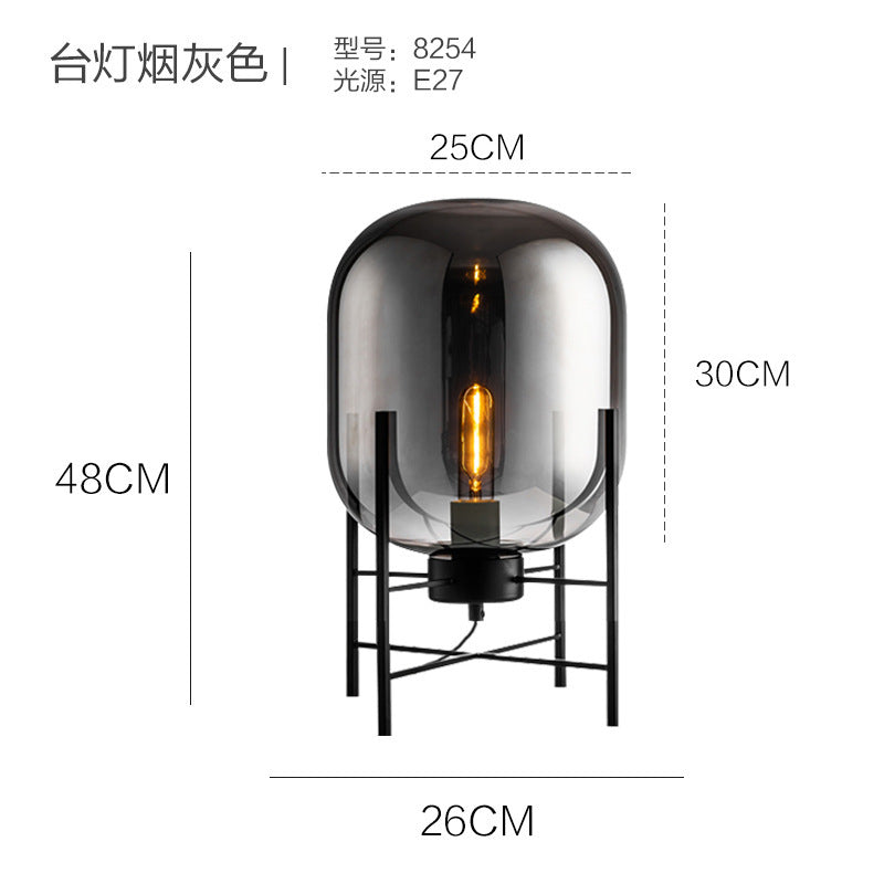 Tall amber glass cage floor lamp in living room