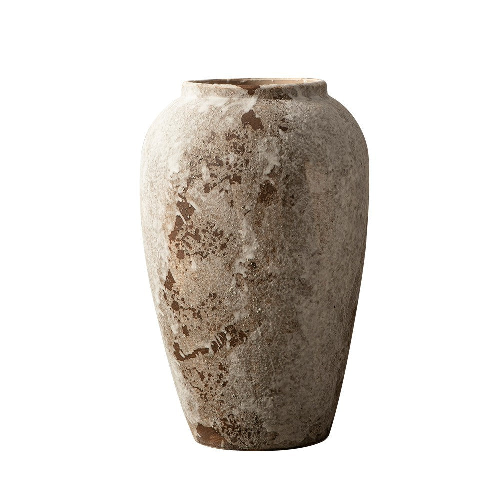 Aged white brown textured ceramic vase isolated front view