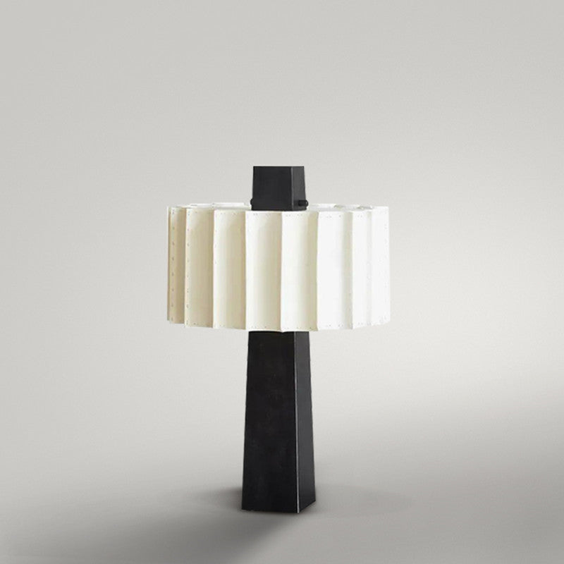 Pleated monolith table lamp styled on console furniture