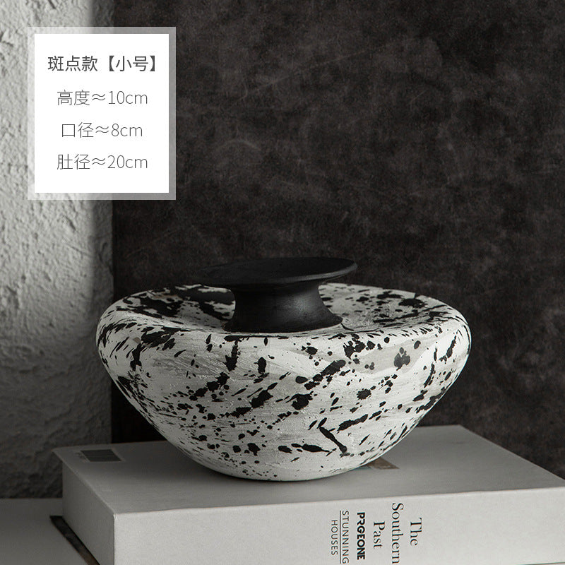 Low black and white splatter ceramic bowl vase approximately 10 cm high