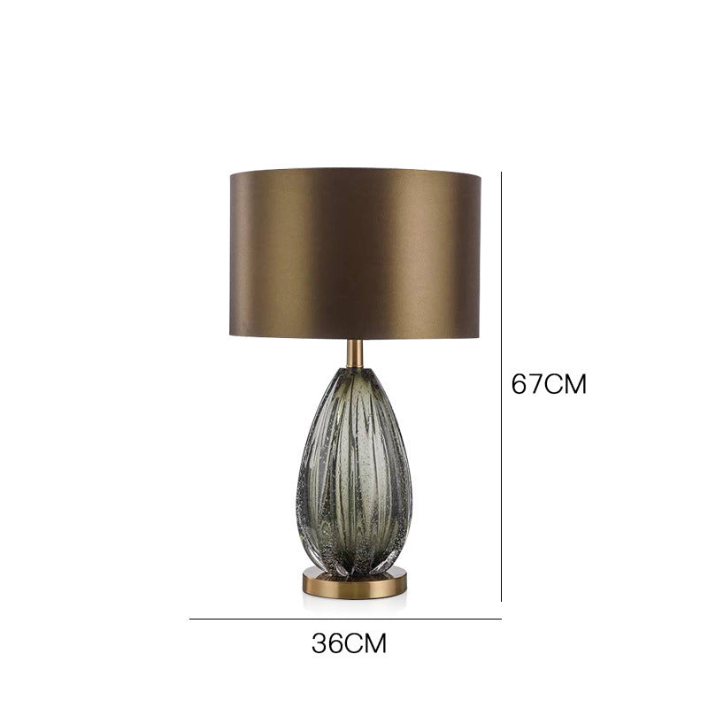 67cm sculptural glass urn bedside lamp with white fabric shade