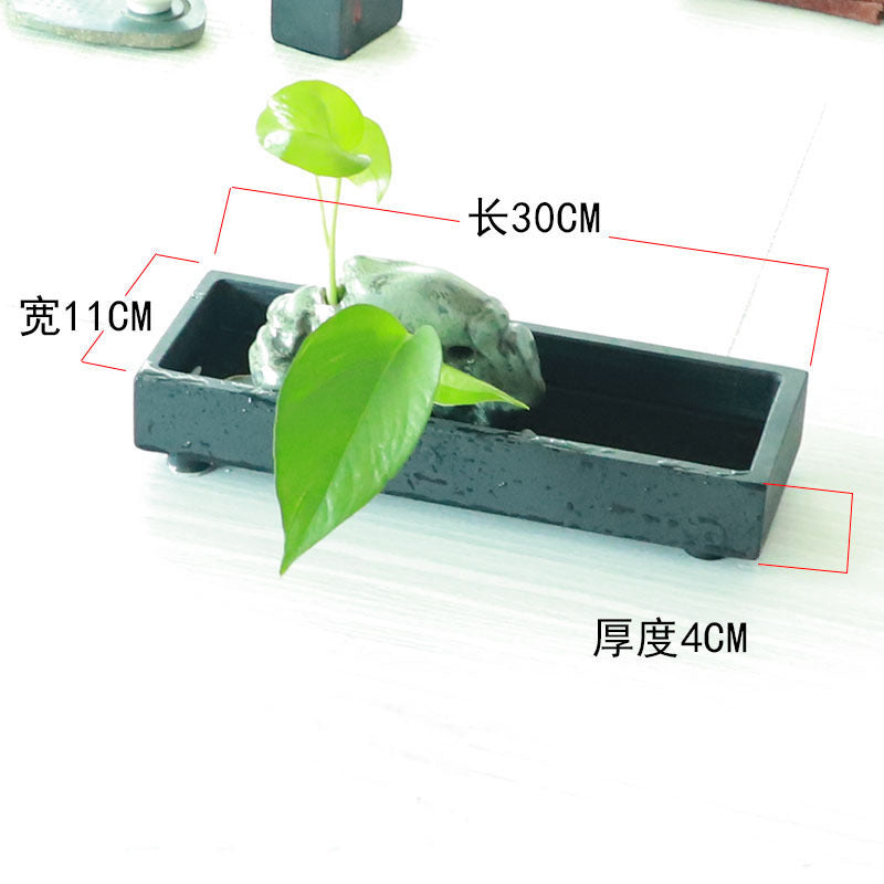 Long black stone micro landscape tray styling example