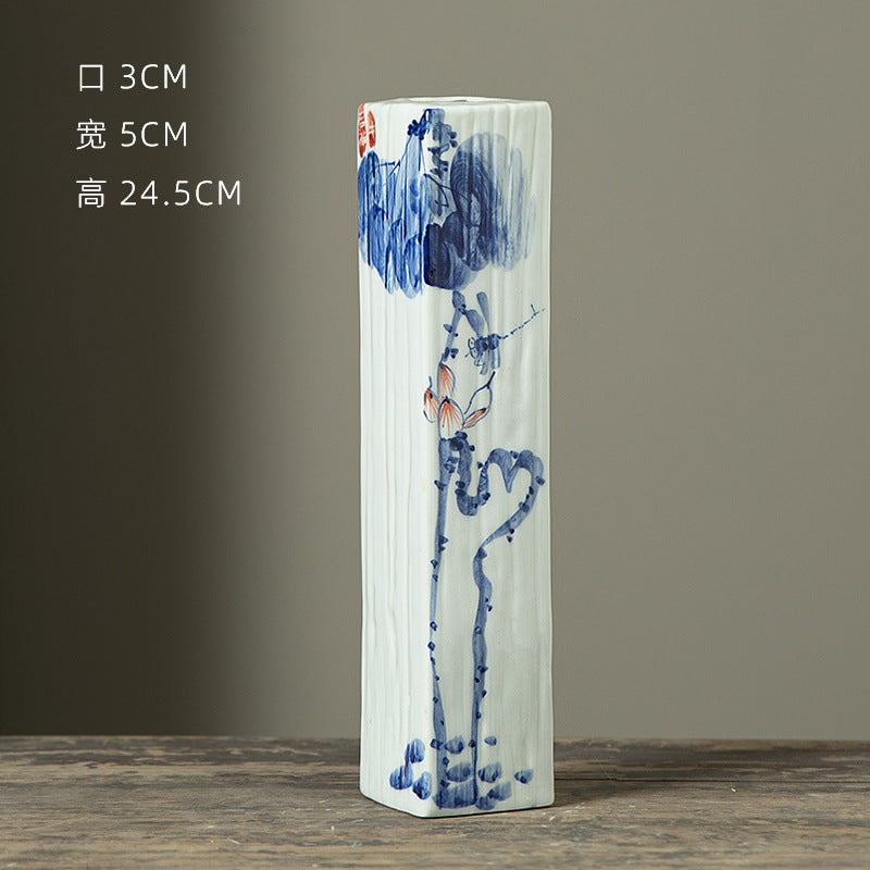 Hand-painted blue white rectangular ceramic bud vase with figure motif, 24.5 cm