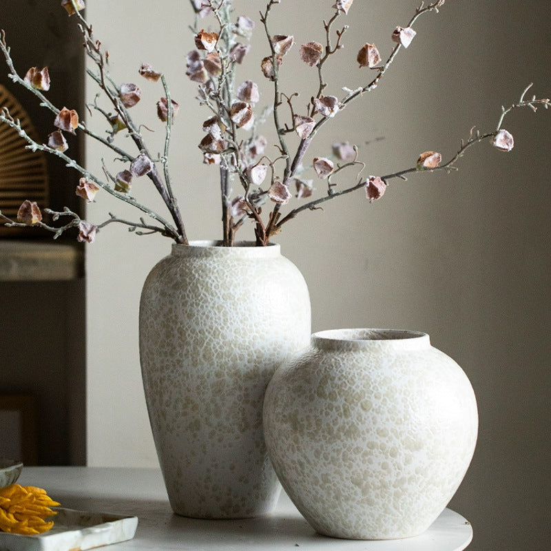 Ivory white crackle ceramic vases styled with blossom branches