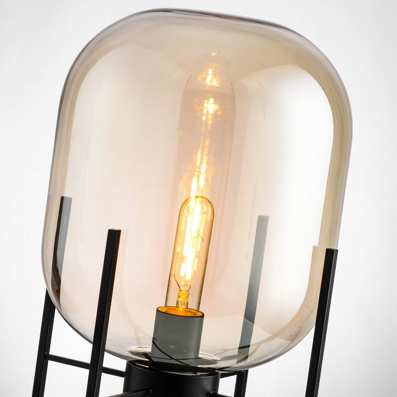Smoke grey capsule glass cage lamp close view