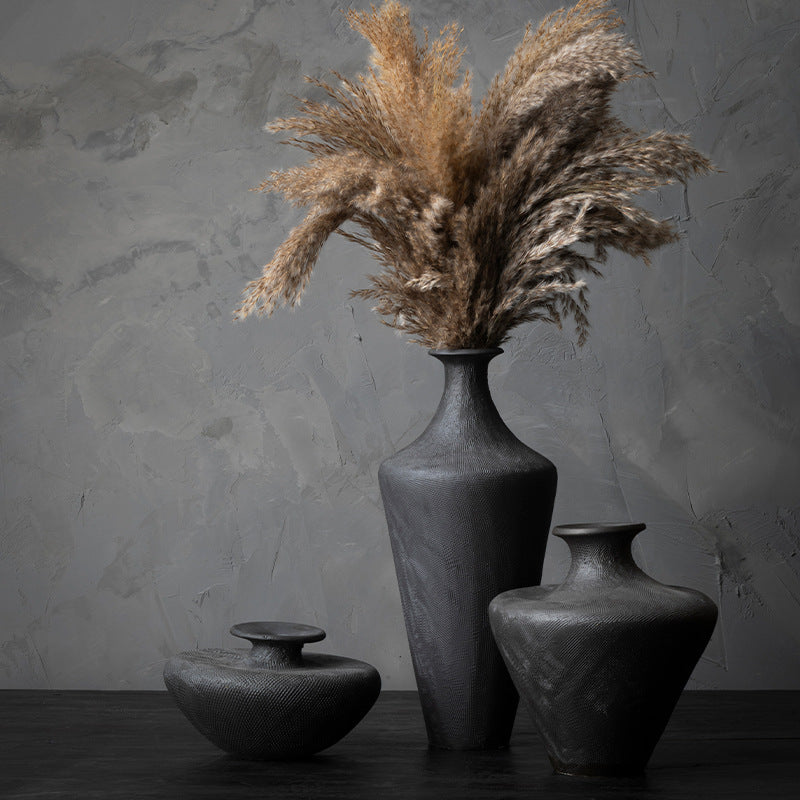 Textured black ceramic vase detail for New Chinese style decor