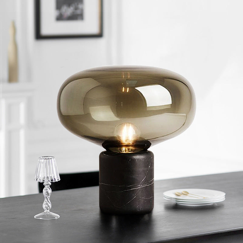 Smoked amber glass mushroom table lamp with black marble cylinder base