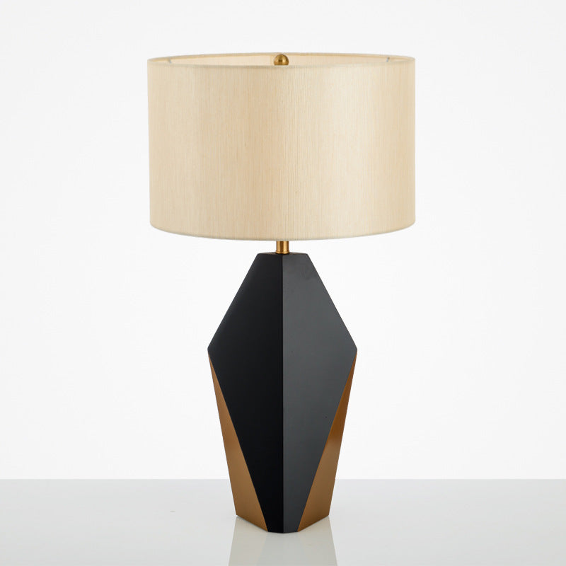 Black gold geometric table lamp product view with cream fabric shade
