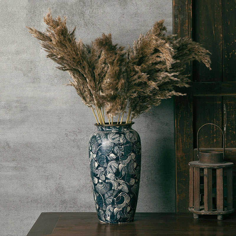 Large indigo shell-pattern ceramic vase with pampas grass