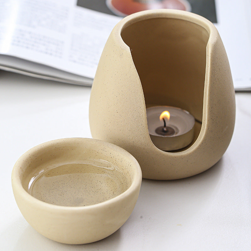 Black ceramic essential oil burner with tealight candle and top aroma bowl