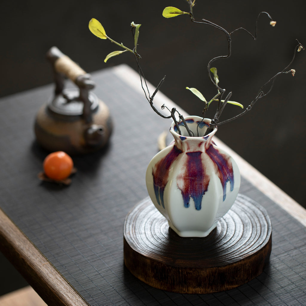 White rainbow drip-glaze ceramic bud vase styled with twisting branch