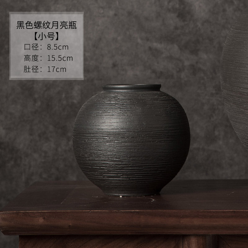Small black ribbed round jar vase 15.5 cm high and 17 cm diameter