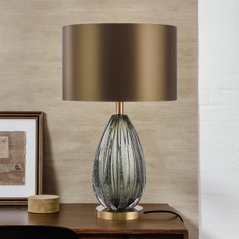 Large ribbed glass urn lamp with deep brown fabric shade and brass accents