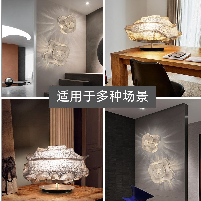 Organic sculptural lighting collection for wall table and pendant placement