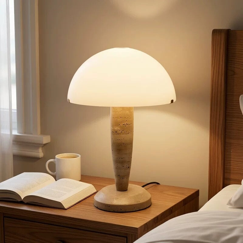 Travertine mushroom table lamp glowing warm light