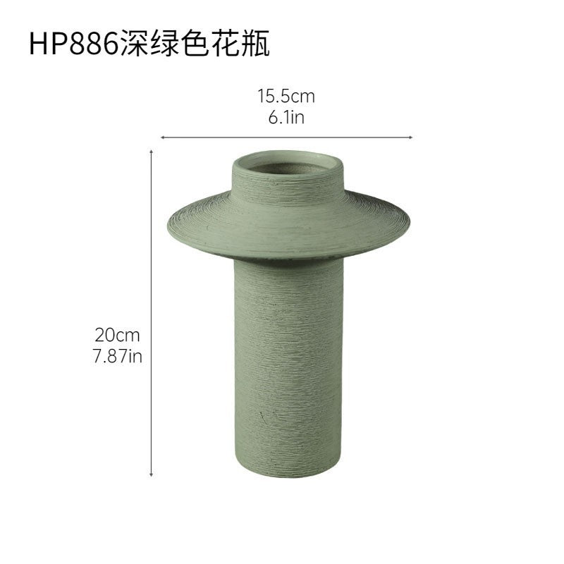 Sage green textured ceramic vase with wide disc collar, 20 cm high and 15.5 cm wide