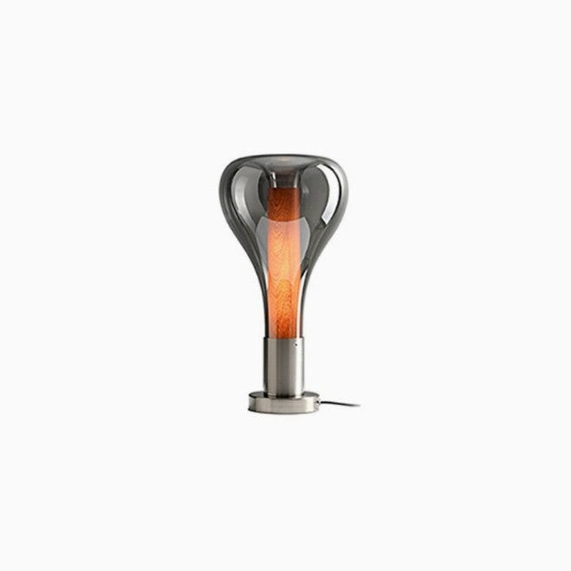 Glass capsule table lamp product view with warm center