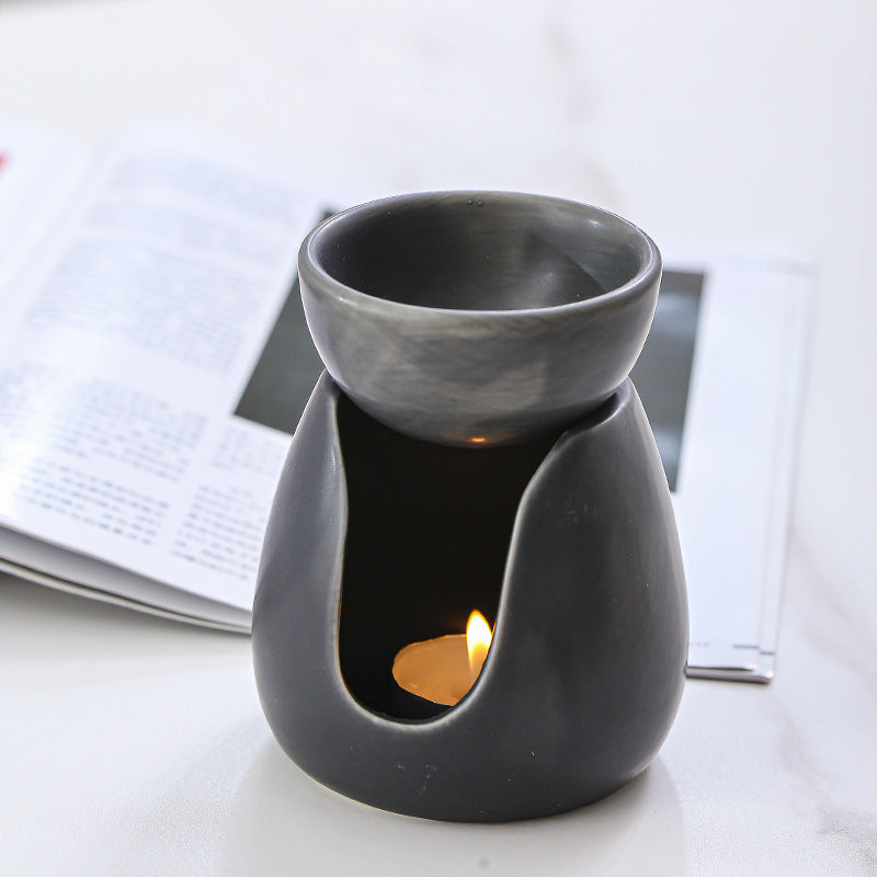 Cream yellow ceramic aroma burner front view for essential oils
