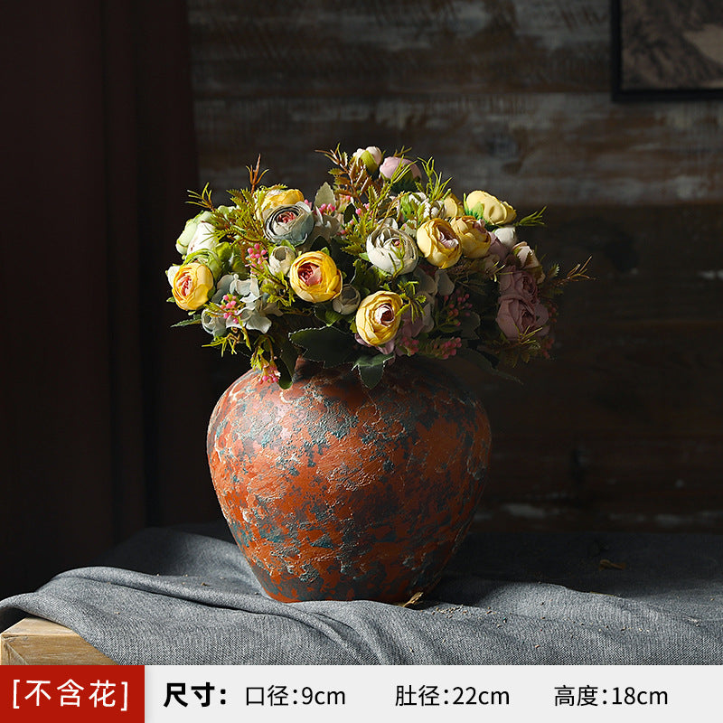 Small rounded terracotta orange and blue-green patina ceramic vase 18 cm high