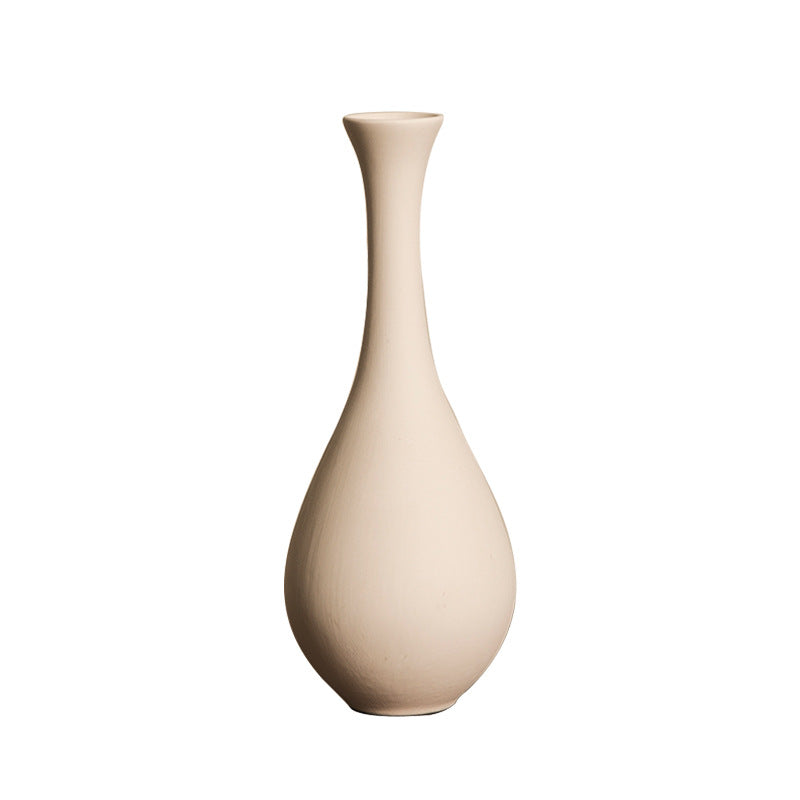 Matte ivory long-neck teardrop ceramic bud vase isolated view