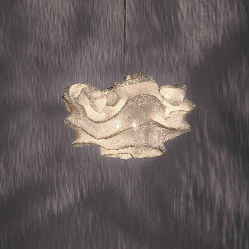 Organic flower form sculptural pendant light viewed from front