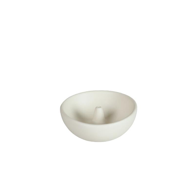 Minimal milk white ceramic incense bowl isolated on white background