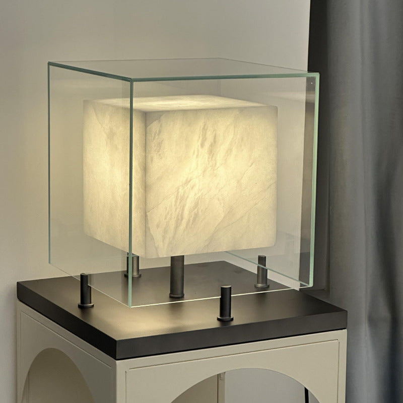 Large glass cube table lamp with illuminated cloud-stone style center