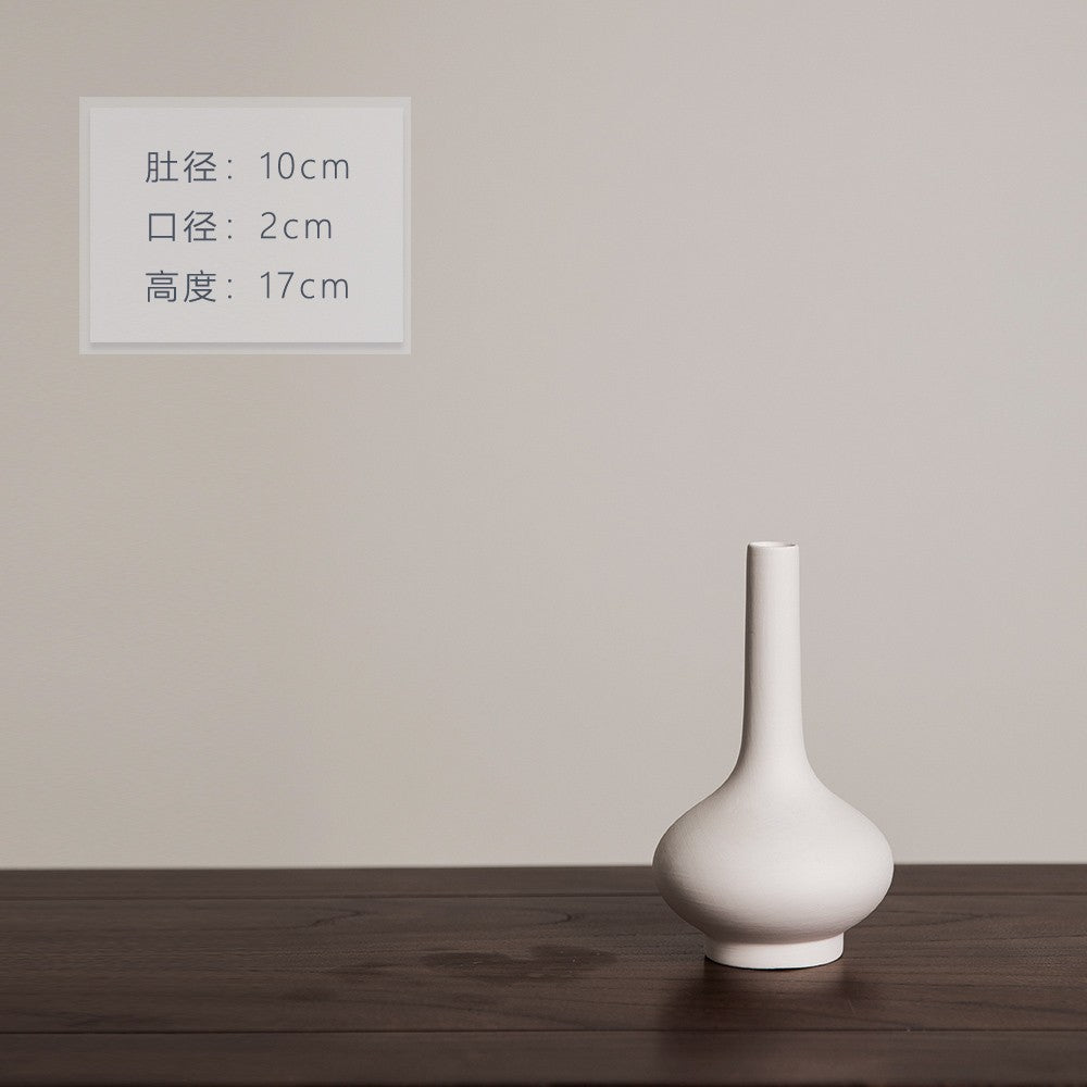 Matte ivory gourd-profile ceramic bud vase, 17 cm high