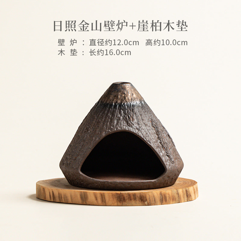 Sunrise mountain ceramic Palo Santo burner approximately 12 cm wide by 10 cm high with wood coaster