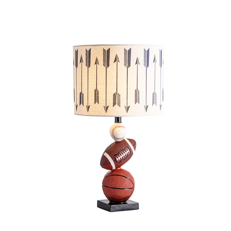 Sports themed bedside lamp styled in a boys bedroom