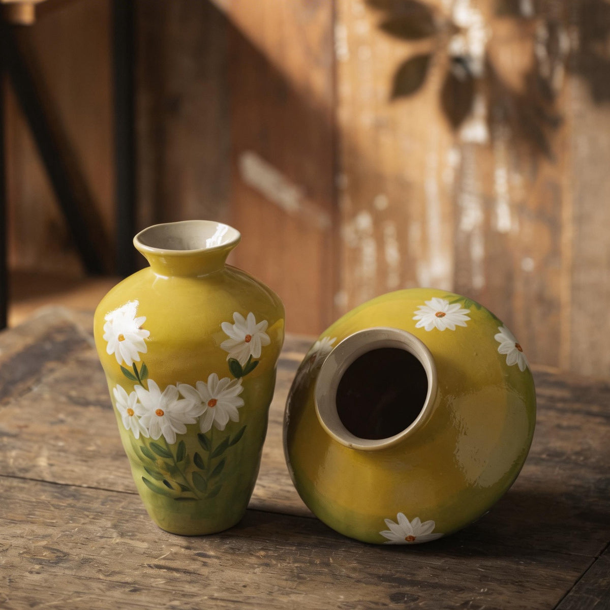 Mustard yellow daisy ceramic vase pair with close-up floral painting